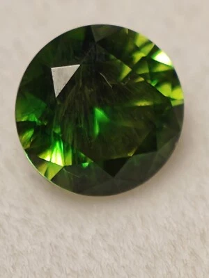 TOP COLOUR  DEMANTOID GARNET HORS TAIL INCLUSION URAL  BOBROVKA 5mm, 0.56ct - Image 1 of 4