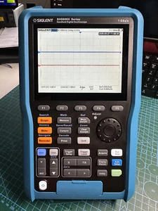 Osciloscopio de mano Siglent SHS810X (2 canales, 2 GSa/s, 100 MHz), nuevo en embalaje original - Imagen 1 de 2