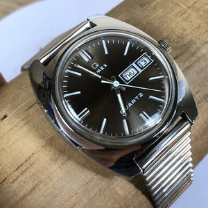 Vintage Timex Q Men Silver Tone Black Dial Day/Date Quartz Analog Watch 8 1/2" - Picture 1 of 14