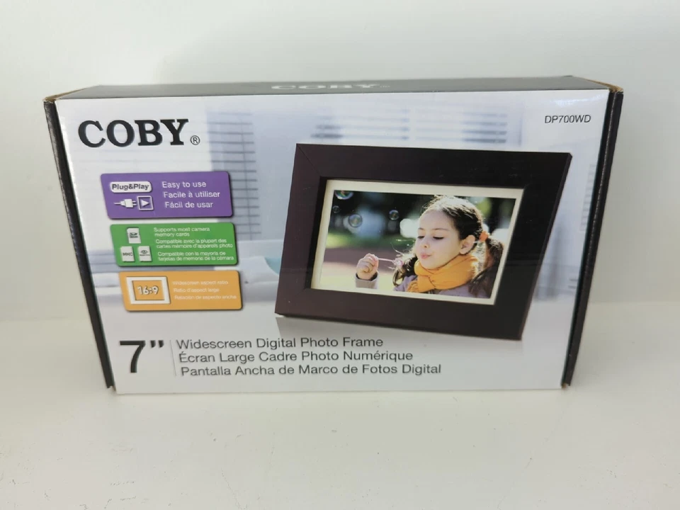 COBY 7" WIDESCREEN DIGITAL PHOTO FRAME~~DP700~~Faux Wood L9 - Image 1 of 4