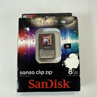 Sandisk Sansa Clip Cremallera 8 GB Reproductor de MP3 Radio FM Grabadora de Voz Nuevo Sellado Gris Foto 1 de 3