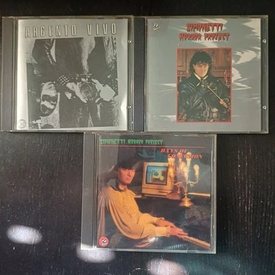LOTTO 2 CD SIMONETTI HORROR PROJECT + CD COMPILATION OST ARGENTO VIVO - Immagine 1 di 4