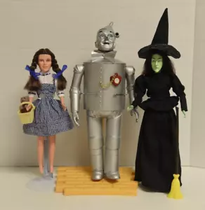 BAMBOLE MAGO DI OZ - DOROTHY (1989) STREGA MALVAGIA (1985) TINMAN (1987) "VINTAGE" - Foto 1 di 21