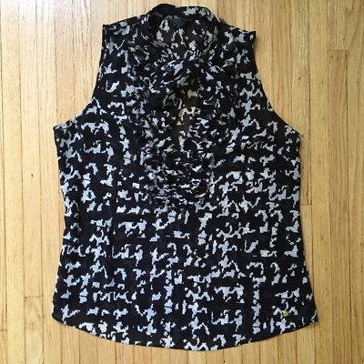 Blusa de mujer Guess sin mangas con cuello en V y volantes talla Pequeño $58 negro Foto 1 de 4