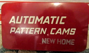 15 Vintage Schnittmuster Nocken New Home in roter Blechdose Nähmaschine Schnittmuster Nocken - Bild 1 von 5