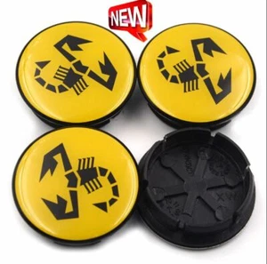 4 x 50 mm suitable for Abarth Scorpio Yellow Alloy Wheel Center Caps Hub Rim Cap - Picture 1 of 5