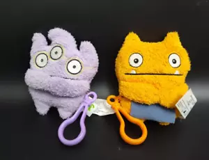Mini llavero de felpa/clips para mochila Ugly Dolls lote de 2 púrpura naranja Hasbro - Imagen 1 de 7