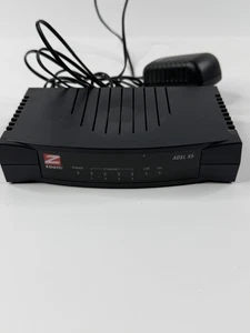 Zoom X5 ADSL Router Model 5654B w/ Power Adapter ONLY - Picture 1 of 10