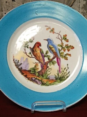 Belle assiette ancienne en porcelaine de Limoges décor aux oiseaux. - Photo 1/4