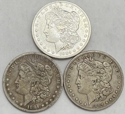 Lote de 3 dólares de plata Morgan 1884-S en estado bastante bueno detalles Foto 1 de 4