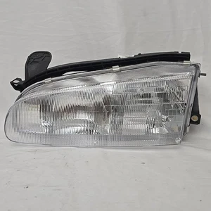 Driver Side Headlight For Geo Prizm 1993-1997 Halogen WITH Bulb(s) Base Lsi - Picture 1 of 12