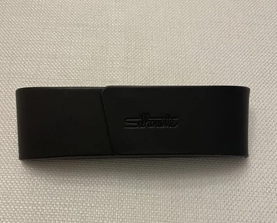 Estuche rígido para gafas Silhouette gris pequeño abatible magnético Foto 1 de 4