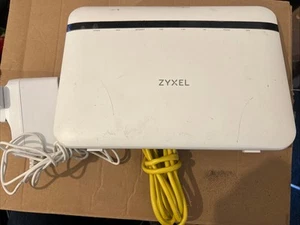 Routeur sans fil double bande ZYXEL EX5401-B1 AX6000 IAD Wi-Fi 6 4 ports (sans support) - Photo 1/2