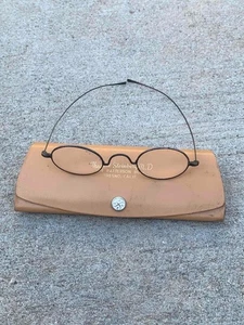 Anteojos antiguos con borde de alambre de forma ovalada de metal gris puente de silla de montar con estuche - Imagen 1 de 5