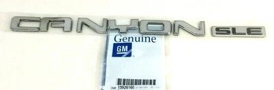 GMC Canyon SLE 2004-2012 portón trasero cromado placa de identificación emblema nuevo OEM 15926160 Foto 1 de 4