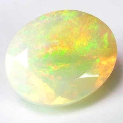ADORABLE RAINBOW SHEEN ETHIOPIAN WHITE OPAL GEM 1.8CT - OVAL CUT - Image 1 of 3