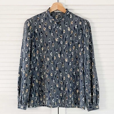 Blusa Jaeger vintage 34 pulgadas busto pequeño gris estampado cuello alto Foto 1 de 4