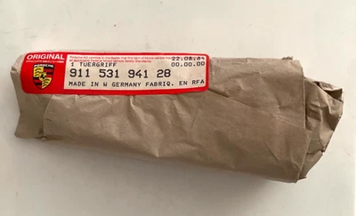 NOS FACTORY PORSCHE 911 930 OUTER BLACK DOOR HANDLE 1974-84 PART # 91153194128 - Image 1 of 4