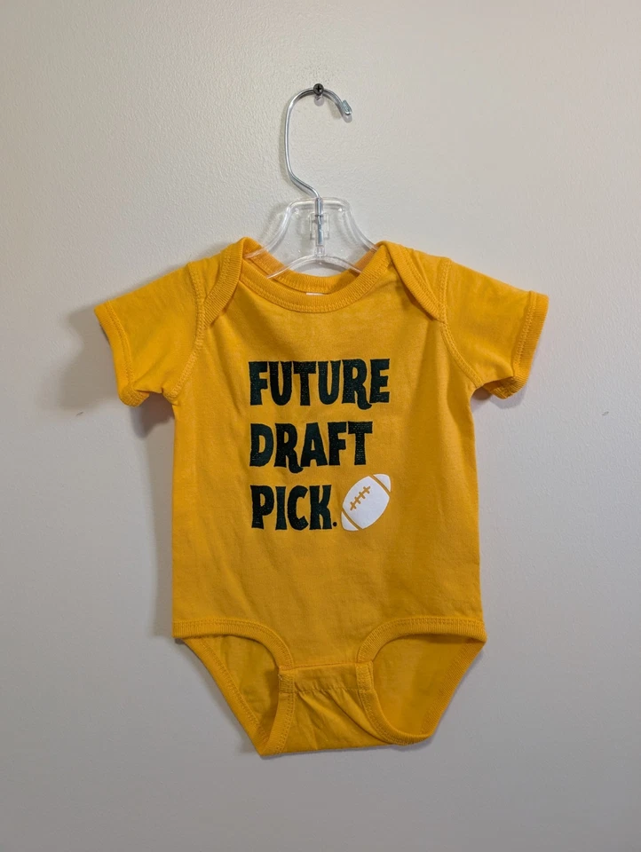 NWT Baby Size 12M Green And Gold Packers Future Draft Pick Football One Piece - Image 1 of 2