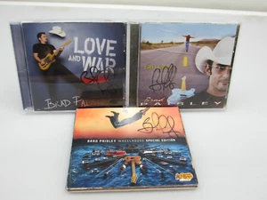 3 Brad Paisley SIGNED CD Lot Wheelhouse 5th Gear Love and War Autographed - Picture 1 of 16