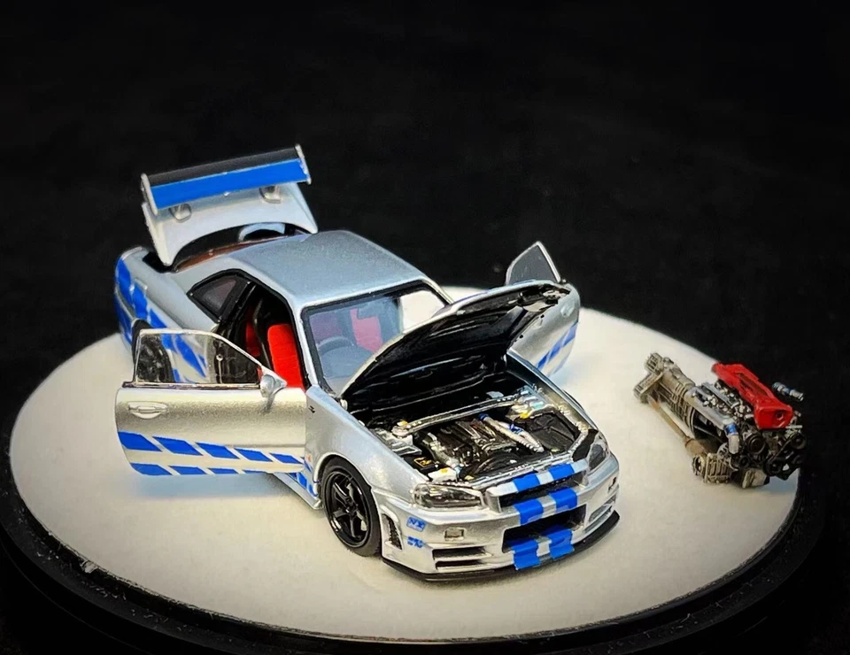 1/64 PGM Nissan Skyline GTR R34 Silver with Blue Stripe Full Open Highend Ver - Image 1 of 1