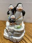 The San Francisco Music Box Company Penguins Ice Fishing Revolves Porcelain Bird