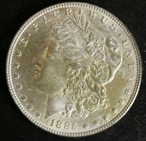 1885 P Morgan Silver Dollar BU. Hint Of Gold Toning. BenLA1