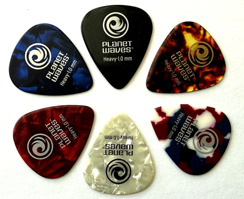 Paquete de 6 selecciones surtidas de guitarra Planet Waves de 1,0 mm pesadas (6 paquetes de mezcla) nuevas celuloides Foto 1 de 4