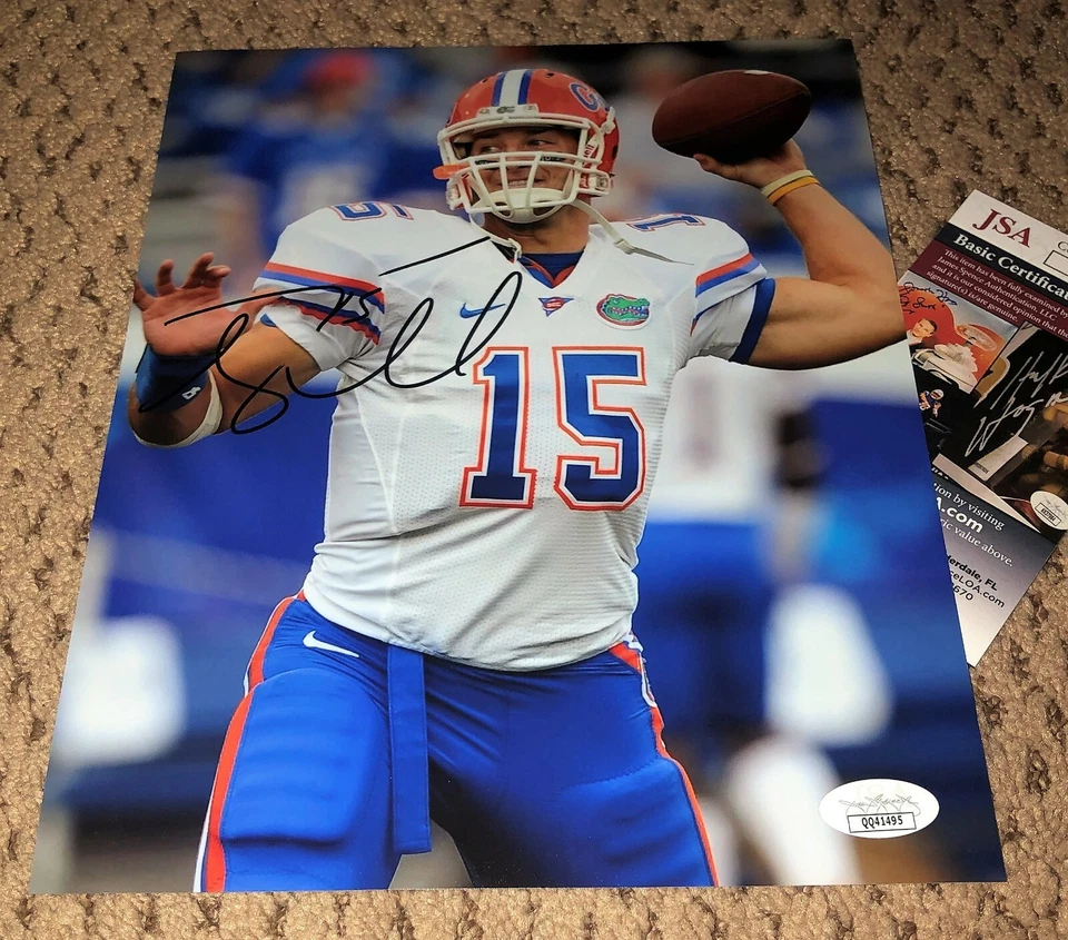 TIM TEBOW SIGNED 8X10 PHOTO AUTOGRAPH FLORIDA GATORS FOOTBALL JSA COA AUTO  - Image 1 of 1