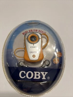 NEW Coby Mini AM/FM Radio Orange CX-71 With Headphones Sealed - Image 1 of 2