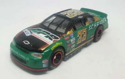 1998 Racing Champions Ken Schrader Monte Carlo #33 APR Racing NASCAR Green - Image 1 of 4