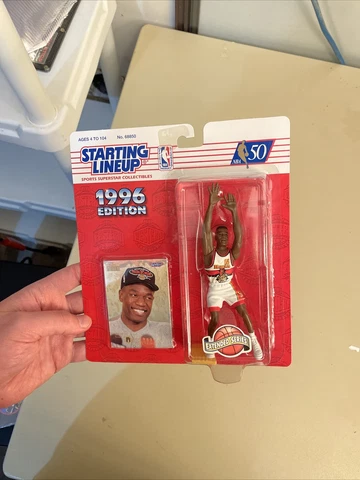 1996 NBA Starting Lineup Dikembe Mutombo Kenner Figure with Collector Card Cover
