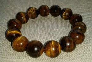 Alte Armkette Tigerauge mit großen geschliffenen Kugeln Durchmesser ca. 15 mm  - Bild 1 von 6