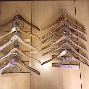 VINTAGE lot of 11 WOODEN SUIT HANGERS with PANTS CLAMP as well really nice condi