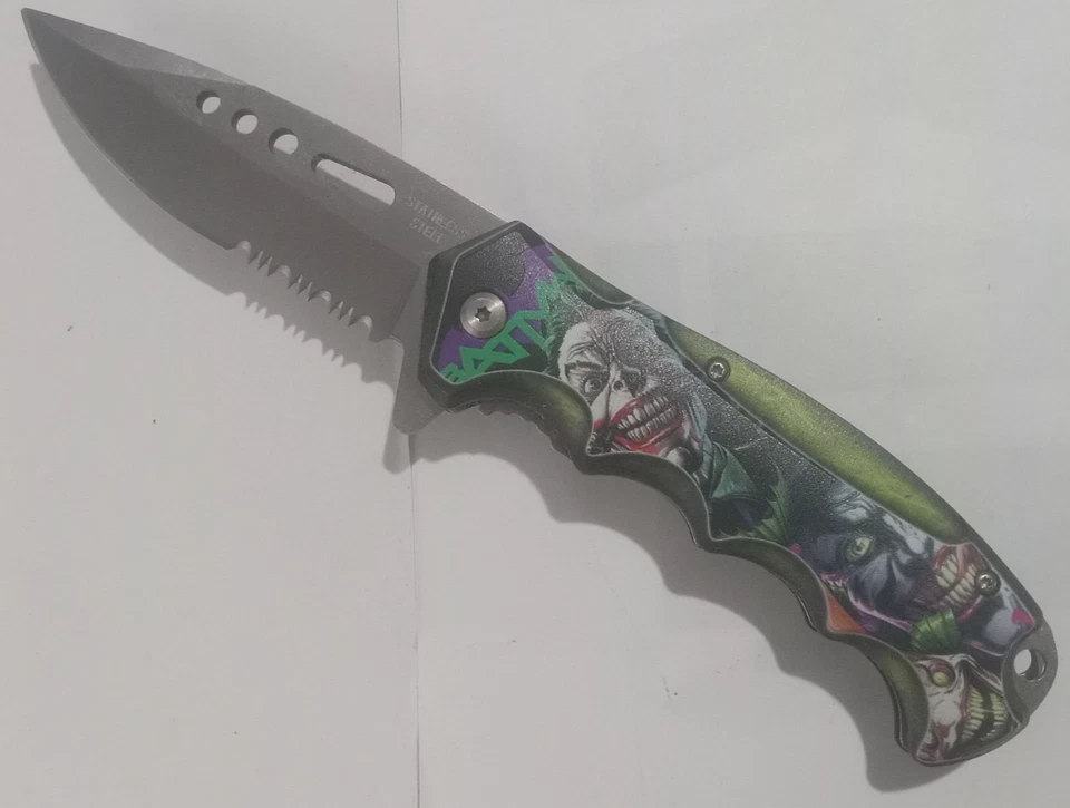 Navaja de Bolsillo Plegable Asistida por Resorte con Mango Joker 2 Caras Hoja Media Dentada Foto 1 de 1