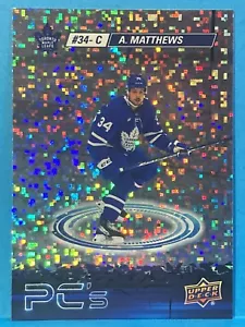 2023-24 Upper Deck Serie 2 Auston Matthews PC's #PC-35 Brillo Paralelo - Imagen 1 de 2