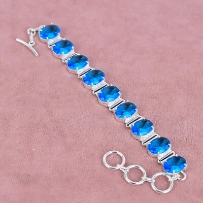 Pulsera ajustable de plata de ley 925 hecha a mano con piedras preciosas de topacio azul suizo Foto 1 de 4