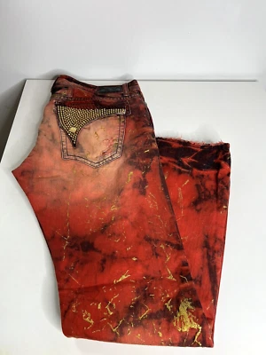 Jeans Robins para hombre 42 tachonados solapa larga lavado ácido cardinal y dorado con jeans Aurum  Foto 1 de 4