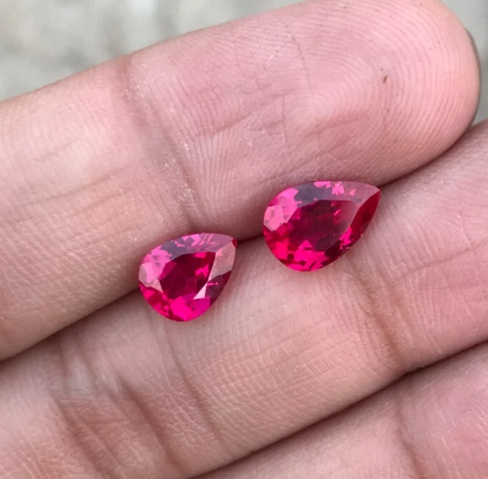 Lab Ruby Pear Cut 2 Piece 10X7 mm & 6X6.5 mm 4.45 Cts Pigeon Blood Ruby Corundum - Image 1 of 4