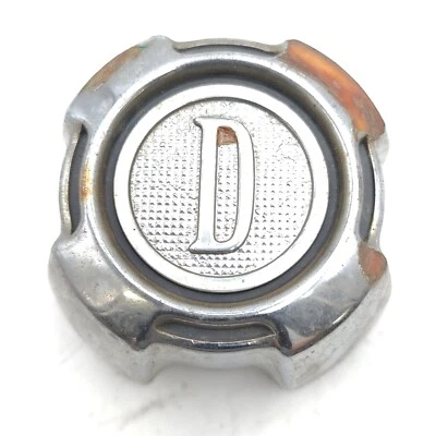 Tapacubos central de rueda Datsun B310 Nissan D vintage plateados 40343 W5710 genuino OEM Foto 1 de 4