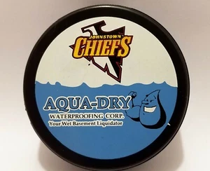 2005-06 JOHNSTOWN CHIEFS Aqua-Dry ECHL HOCKEY PUCK AD BACK - Picture 1 of 2