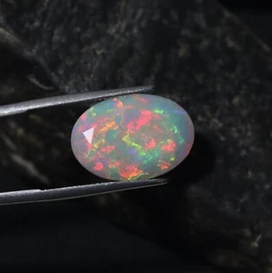 10,7 Karat Natürlicher Regenbogen Feuer Äthiopischer Opal Ovalschliff 20,2x14,2 mm - Bild 1 von 10