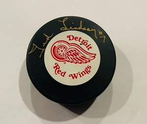 TED LINDSAY DETROIT RED WINGS H.O.F. LEGEND HANDSIGNIERTER PUCK - Bild 1 von 2
