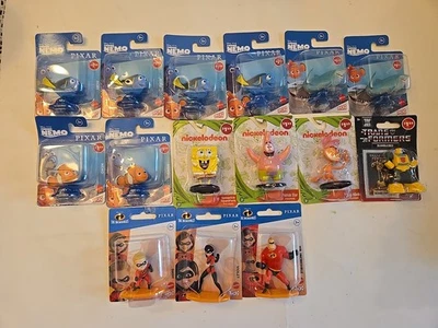 Mini figuras Disney Buscando a Nemo-Dory, Nemo, Bruce, Marlin y chorro Foto 1 de 4
