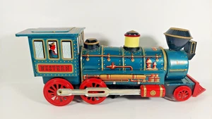 60er Jahre BATTERIEBETRIEBENE MYSTERY ACTION WESTERN SONDERLOK BLECHBAHN funktioniert - Bild 1 von 7