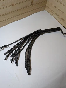 9 Schwanz schwarze Rohfellpeitsche. 20" Länge - Bild 1 von 1