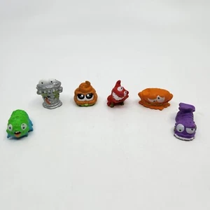 6 mini figuras Zuru Smashers Gross Out zapato basura perro rojo caca gusano - Imagen 1 de 5