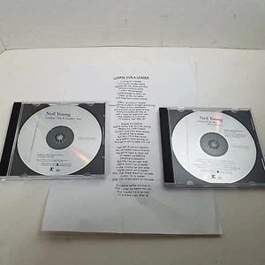 2 Neil Young Promo CD 2006 Looking For a Leader Single Living W War Album Adv - Bild 1 von 4