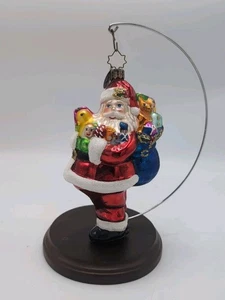 Christopher Radko SANTA 5 pulgadas rojo adorno de Navidad bolsa azul, brazo lleno de juguetes - Imagen 1 de 5