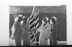 (1) B&W Press Photo Negative Flag Pole Men Suits Hand Shake Portrait - T5320